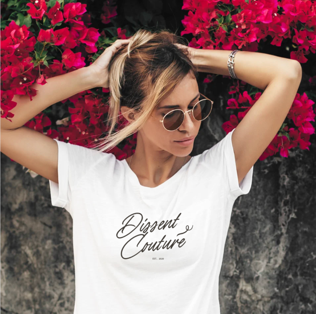 Dissent Couture is the elevated arm of Dissent Wear — avant-garde design that fuses art, activism, and ethical luxury. Each piece tells a story of defiance, compassion, and courage.&amp;nbsp; Kind Rebels, Petite Rébellion included.