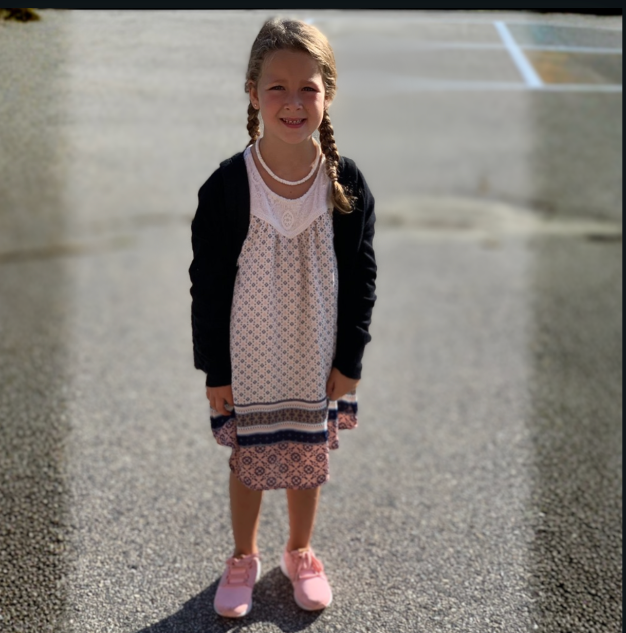 little girl dresses playful and confident 